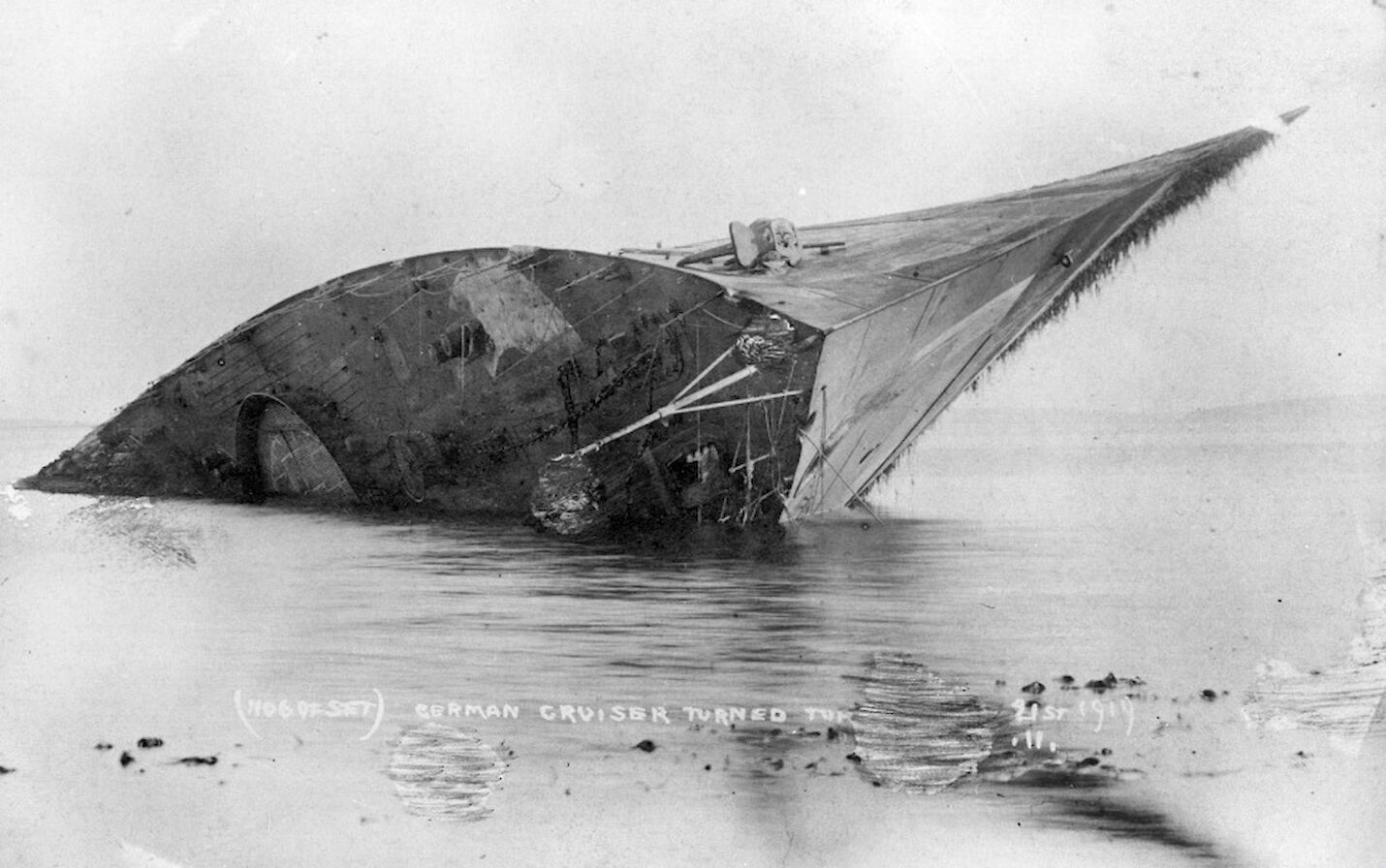 The light cruiser Bremse turned turtle in Scapa Flow - image courtesy Orkney Library & Archive