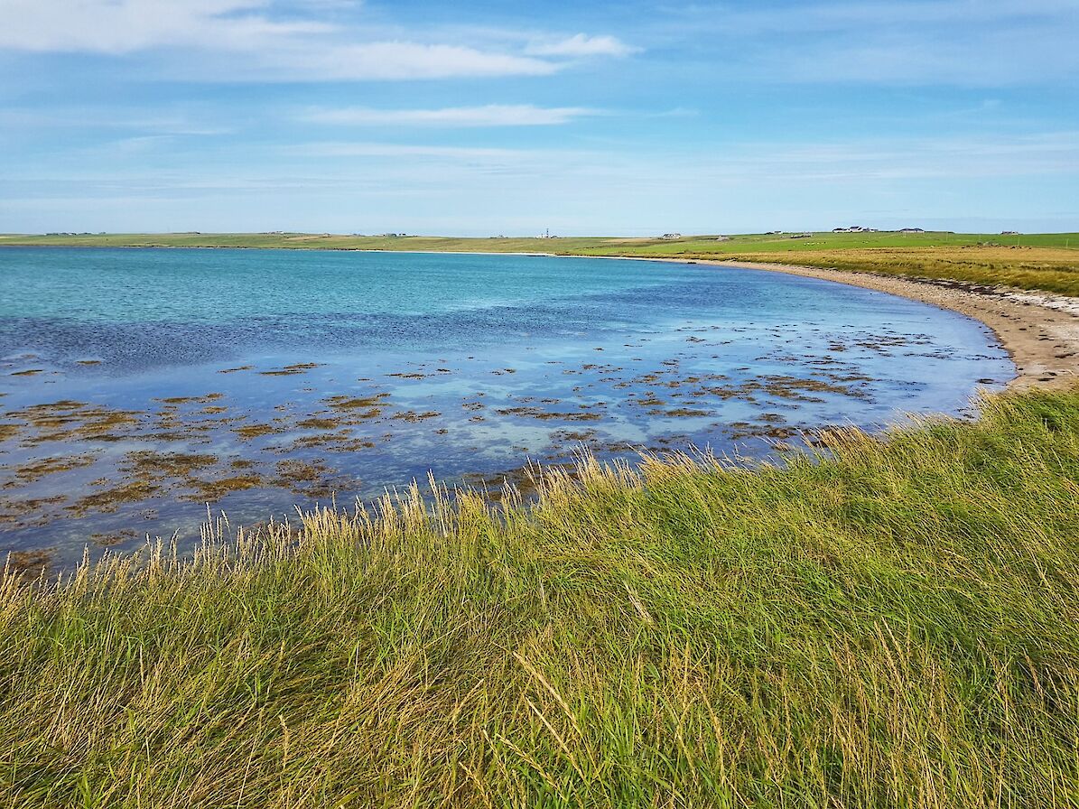 Blue skies and clear waters in Stronsay - image by Susanne Arbuckle