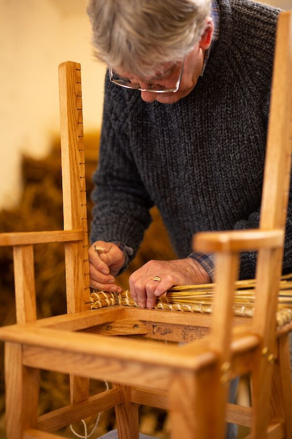 Jackie Miller working on an Orkney chair at Scapa Crafts