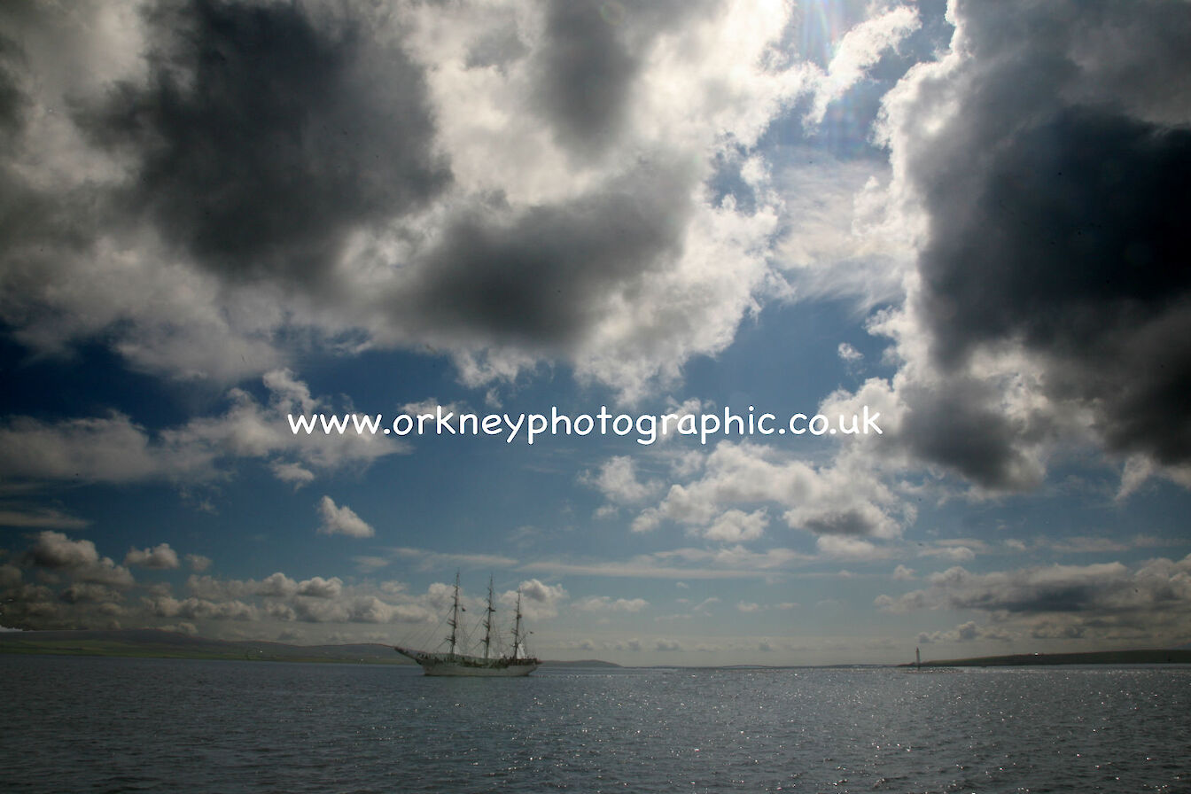 A spectacular orkney sky displays the majesty of a tall ship in Scapa Flow. pic orkney photographic