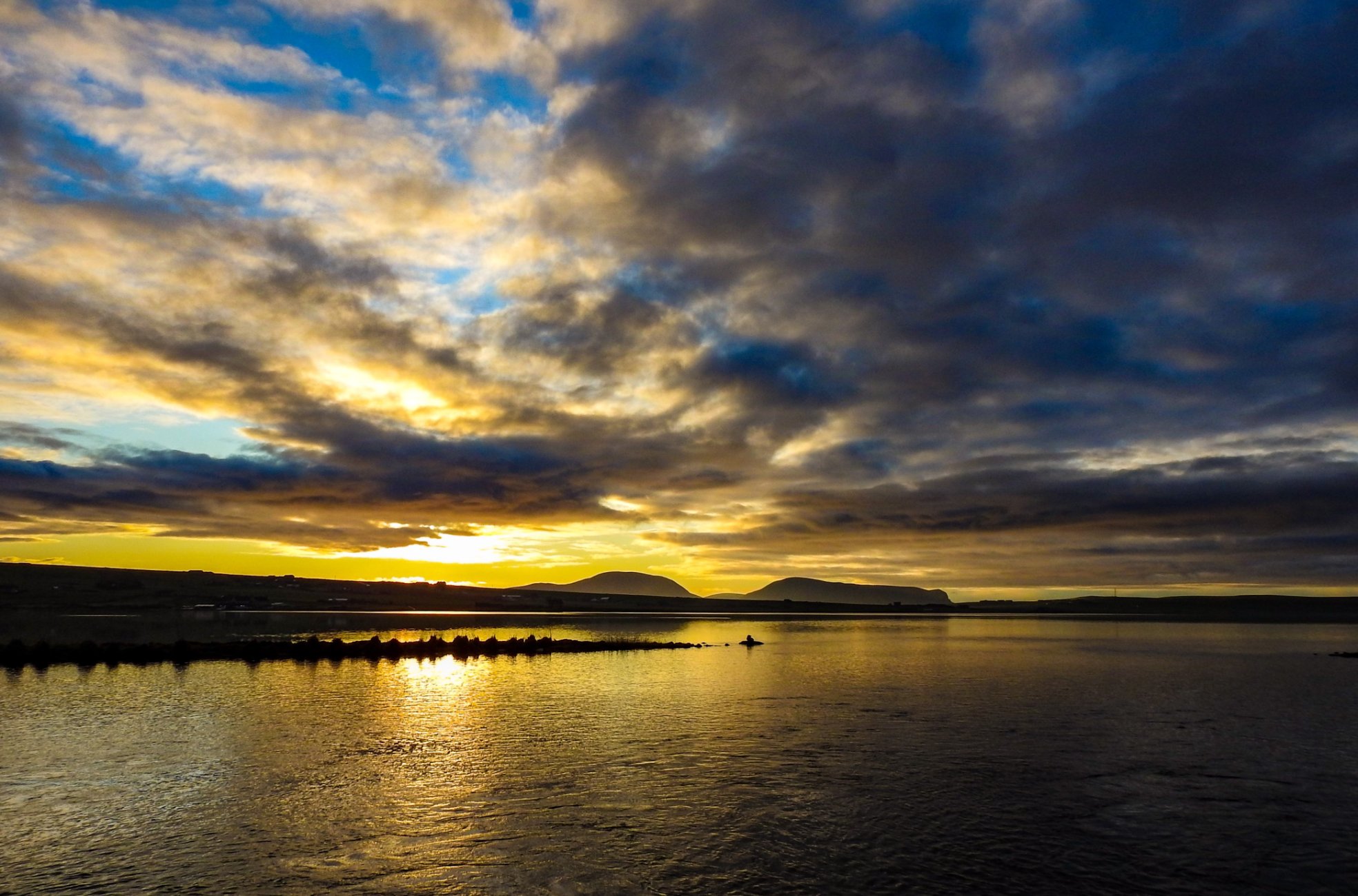 Sunset over the Stenness Loch in Orkney - image by Scott Oxford