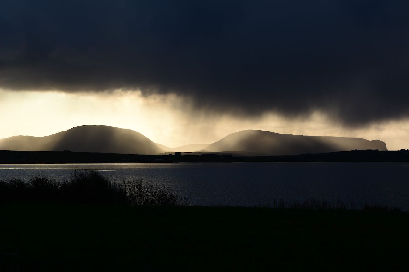 Rain clearing from the Hoy hills - image by Nick Card