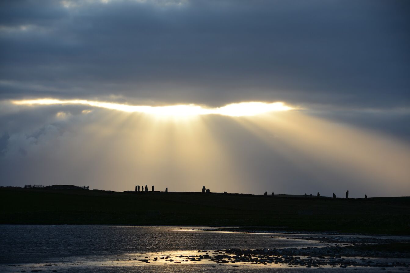 Sun burst over the Ring of Brodgar, Orkney - image by Nick Card