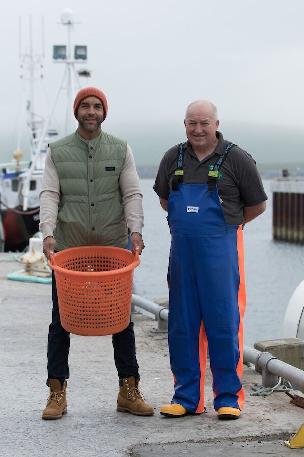 Alex with local fisherman Robbie Hutchison in the island of Westray - image by Kim Lomax