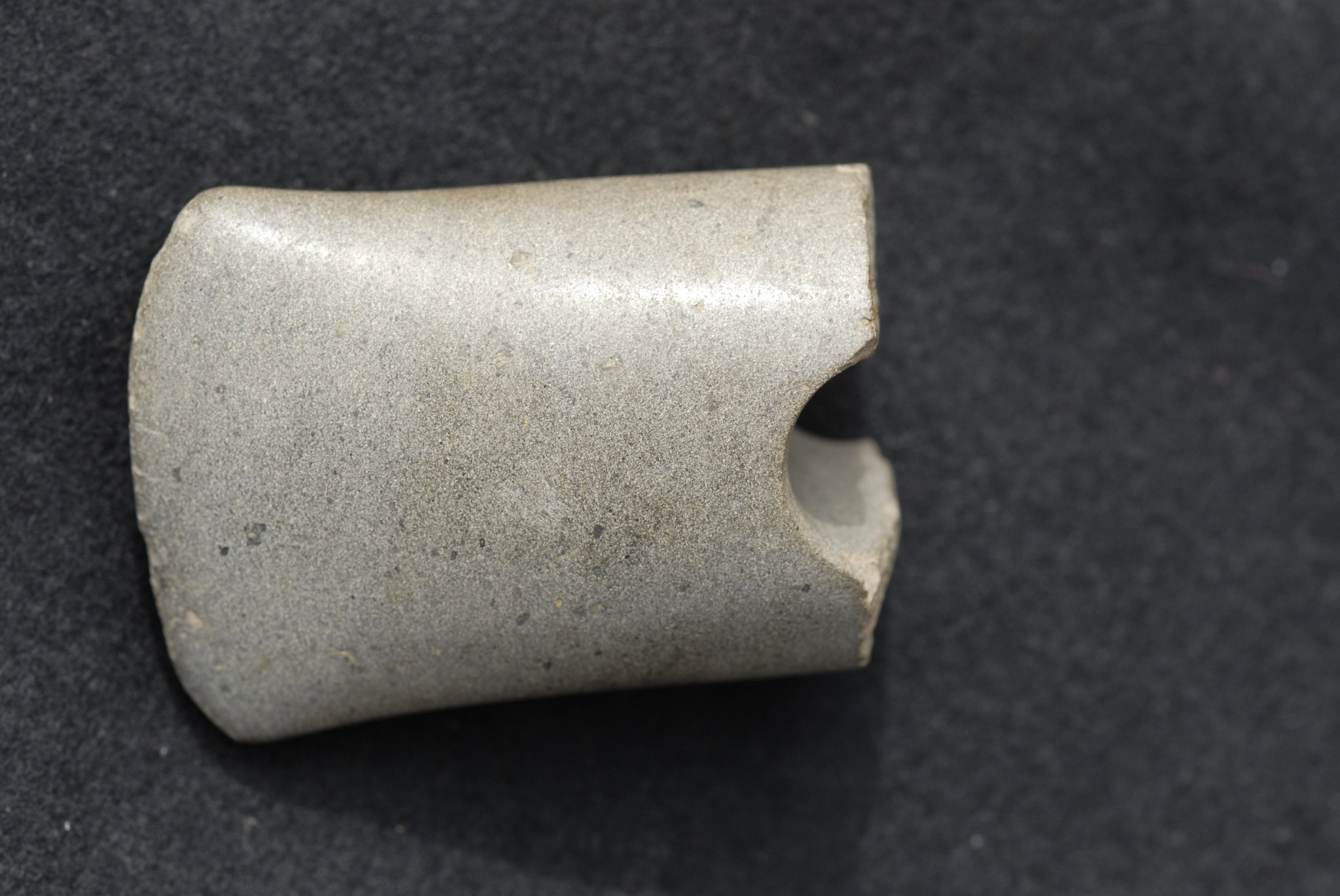 Polished broken stone macehead - image by Ola Thoenies