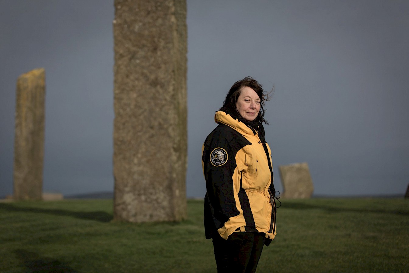 Historic Environment Scotland Ranger Sandra Miller at the Standing Stones of Stenness